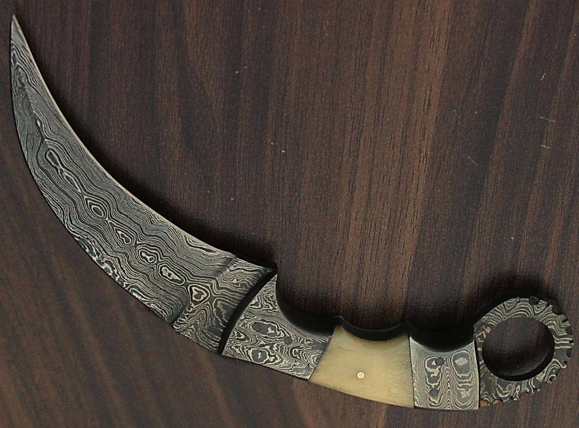 handmade Damascus karambit camel handle